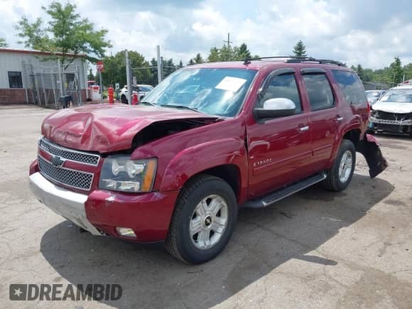2007 Chevrolet Tahoe LS with VIN 1GNFK13087R424576, listed as a IAAI auction lot 42850609 with 96,099 mi miles and . Bid and sale history available at DreamBid. Image 2.