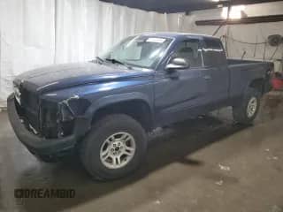 2004 Dodge Dakota Sport with VIN 1D7HG32N54S525290, listed as a Copart auction lot 77141804 with 217,012 mi miles and Salvage title. Bid and sale history available at DreamBid. Image 1.