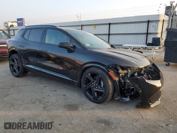 2024 Chevrolet Equinox EV RS z VIN 3GN7DNRP1RS239635, wystawiony jako Copart lot #82921244 z przebiegiem 5 063 mil mil oraz Szkoda całkowita • Salvage title. Historia ofert i sprzedaży dostępna na DreamBid. Obrazek 4.
