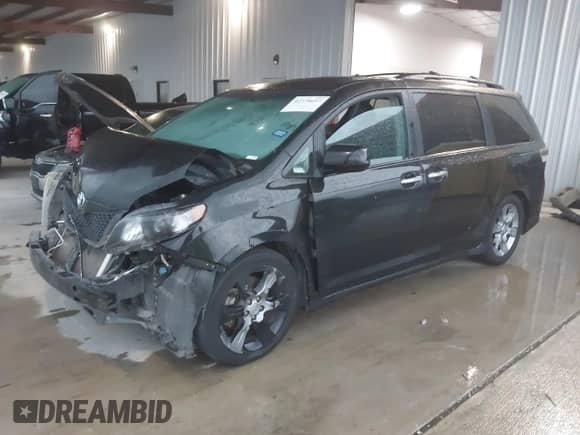 2014 Toyota Sienna SE with VIN 5TDXK3DC5ES456630, listed as a IAAI auction lot 42370657 with 164,633 mi miles and . Bid and sale history available at DreamBid. Image 17.