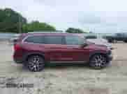 2021 Honda Pilot Touring 7-Passenger z VIN 5FNYF6H66MB062166, wystawiony jako IAAI lot #42550464 z przebiegiem 52 376 mil mil oraz . Historia ofert i sprzedaży dostępna na DreamBid. Obrazek 13.