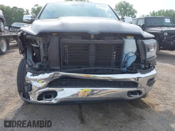 2021 Ram 1500 Laramie z VIN 1C6SRFJT3MN538900, wystawiony jako IAAI lot #42924937 z przebiegiem 28 946 mil mil oraz . Historia ofert i sprzedaży dostępna na DreamBid. Obrazek 6.