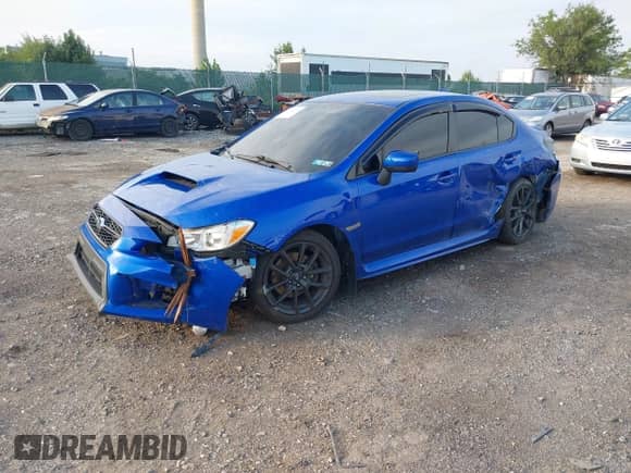 2021 Subaru WRX Premium with VIN JF1VA1C69M9816477, listed as a IAAI auction lot 42616995 with 54,668 mi miles and . Bid and sale history available at DreamBid. Image 2.