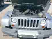2008 Jeep Wrangler Unlimited Sahara с VIN 1J8GA591X8L628123, выставлен на аукционе IAAI как лот 43102623 с пробегом 231 500 миль миль и . История ставок и продаж доступна на DreamBid. Изображение 10.