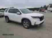 2023 Honda Pilot EX-L with VIN 5FNYG2H55PB004180, listed as a Copart auction lot 80510544 with 27,743 mi miles and Salvage title. Bid and sale history available at DreamBid. Image 4.