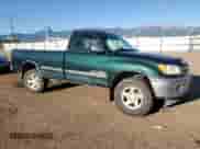 2000 Toyota Tundra SR5 with VIN 5TBKT4412YS057926, listed as a Copart auction lot 80147765 with 189,851 mi miles and Salvage title. Bid and sale history available at DreamBid. Image 4.