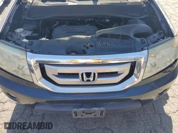 2009 Honda Pilot Touring with VIN 5FNYF488X9B041284, listed as a Copart auction lot 64602555 with 273,147 mi miles and Salvage title. Bid and sale history available at DreamBid. Image 12.