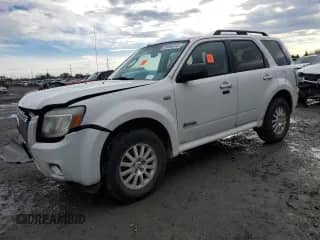 2009 Mercury Mariner Hybrid with VIN 4M2CU29309KJ04980, listed as a Copart auction lot 85360014 with 166,860 mi miles and Salvage title. Bid and sale history available at DreamBid. Image 1.