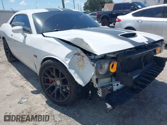 2016 Dodge Challenger SRT 392 with VIN 2C3CDZDJ2GH299591, listed as a IAAI auction lot 43114785 with 52,023 mi miles and . Bid and sale history available at DreamBid. Image 6.