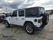 2023 Jeep Wrangler Sahara Altitude with VIN 1C4HJXEG5PW570629, listed as a Copart auction lot 80860234 with 15,121 mi miles and Salvage title. Bid and sale history available at DreamBid. Image 2.