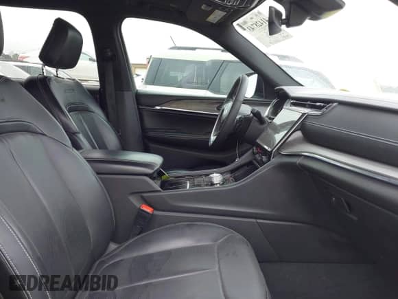 2023 Jeep Grand Cherokee Overland with VIN 1C4RJKDT9P8107466, listed as a IAAI auction lot 41428743 with 34,317 mi miles and . Bid and sale history available at DreamBid. Image 5.