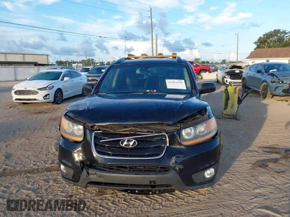 2011 Hyundai Santa Fe Limited with VIN 5XYZKDAG9BG050705, listed as a IAAI auction lot 43069498 with 224,544 mi miles and . Bid and sale history available at DreamBid. Image 12.
