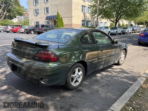 2001 Pontiac Grand Am GT z VIN 1G2NW12E81M522182, wystawiony jako Copart lot #68724715 z przebiegiem 74 661 mil mil oraz Czysty tytuł • Clean title. Historia ofert i sprzedaży dostępna na DreamBid. Obrazek 4.