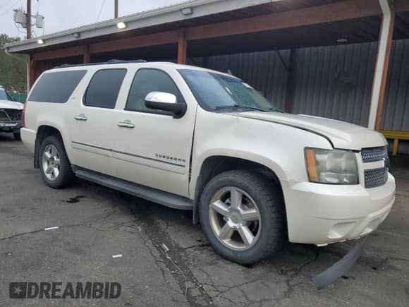 2011 Chevrolet Suburban LTZ с VIN 1GNSKKE3XBR223816, выставлен на аукционе Copart как лот 70764605 с пробегом 166 032 миль миль и Списание • Salvage title. История ставок и продаж доступна на DreamBid. Изображение 4.