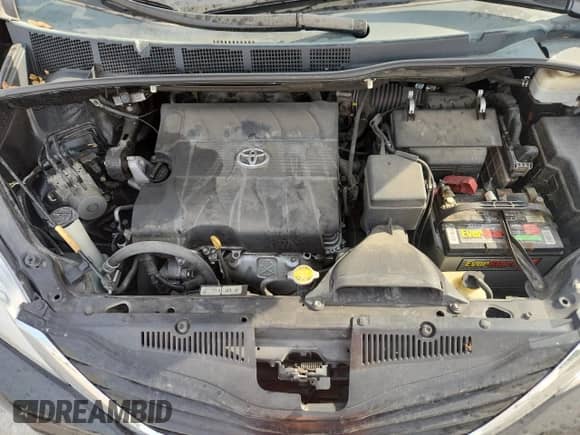 2012 Toyota Sienna LE с VIN 5TDKK3DC6CS272000, выставлен на аукционе Copart как лот 81020445 с пробегом 118 524 миль миль и Списание • Salvage title. История ставок и продаж доступна на DreamBid. Изображение 12.