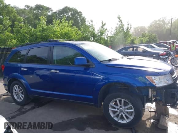 2015 Dodge Journey SXT with VIN 3C4PDDBGXFT574556, listed as a IAAI auction lot 42258095 with 214,267 mi miles and . Bid and sale history available at DreamBid. Image 14.