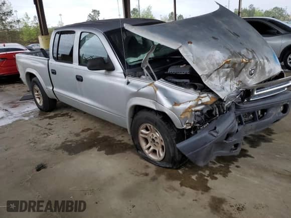 2004 Dodge Dakota Sport с VIN 1D7HL38K74S570546, выставлен на аукционе Copart как лот 49627955 с пробегом 237 321 миль миль и Списание • Salvage title. История ставок и продаж доступна на DreamBid. Изображение 4.