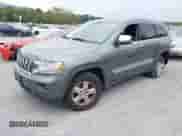 2012 Jeep Grand Cherokee Laredo with VIN 1C4RJFAG3CC272631, listed as a IAAI auction lot 43291923 with 168,220 mi miles and . Bid and sale history available at DreamBid. Image 18.