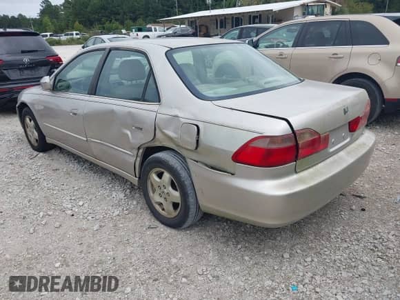 1999 Honda Accord EX with VIN 1HGCG1657XA058310, listed as a IAAI auction lot 43185257 with 208,061 mi miles and . Bid and sale history available at DreamBid. Image 3.