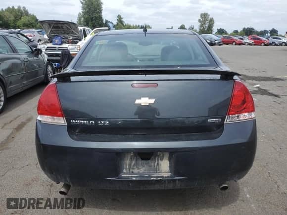 2016 Chevrolet Impala LTZ with VIN 2G1WC5E39G1149922, listed as a Copart auction lot 61812415 with 129,219 mi miles and Salvage title. Bid and sale history available at DreamBid. Image 6.