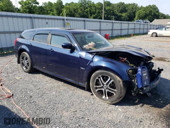 2005 Dodge Magnum RT with VIN 2D4GV58245H625767, listed as a Copart auction lot 60228194 with 163,944 mi miles and Salvage title. Bid and sale history available at DreamBid. Image 4.