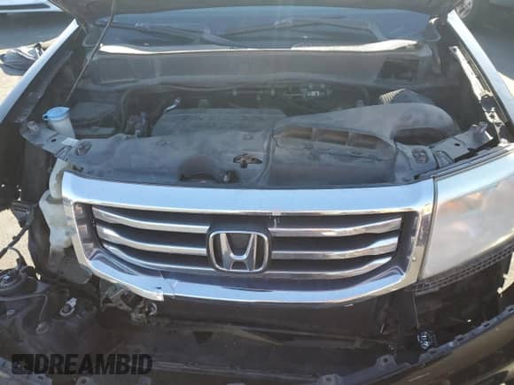 2015 Honda Pilot Touring z VIN 5FNYF3H91FB005305, wystawiony jako Copart lot #71479855 z przebiegiem 129 693 mil mil oraz Szkoda całkowita • Salvage title. Historia ofert i sprzedaży dostępna na DreamBid. Obrazek 12.
