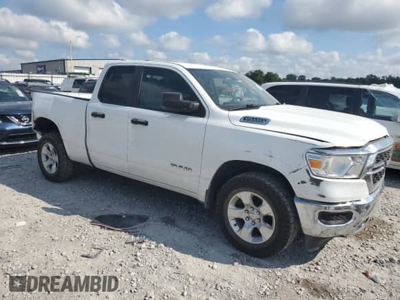 2023 Ram 1500 Big Horn with VIN 1C6SRFBTXPN558127, listed as a Copart auction lot 69635675 with 105,950 mi miles and Salvage title. Bid and sale history available at DreamBid. Image 4.