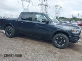 2019 Ram 1500 Rebel z VIN 1C6SRFLT1KN784936, wystawiony jako IAAI lot #42375986 z przebiegiem 78 539 mil mil oraz . Historia ofert i sprzedaży dostępna na DreamBid. Obrazek 1.