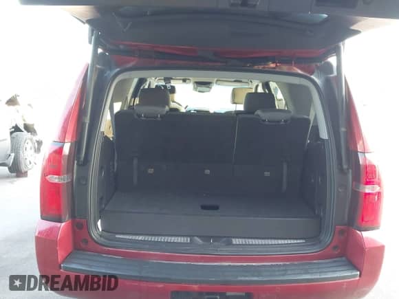 2015 Chevrolet Tahoe LT z VIN 1GNSKBKC9FR126438, wystawiony jako IAAI lot #43276273 z przebiegiem 92 503 mil mil oraz . Historia ofert i sprzedaży dostępna na DreamBid. Obrazek 17.