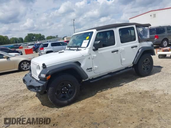 2021 Jeep Wrangler Unlimited Sport Altitude with VIN 1C4HJXDN3MW759324, listed as a IAAI auction lot 43048122 with 65,984 mi miles and . Bid and sale history available at DreamBid. Image 2.