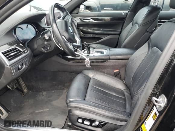 2019 BMW 7 Series 740i xDrive with VIN WBA7E4C5XKGV70108, listed as a Copart auction lot 67403785 with 62,574 mi miles and Salvage title. Bid and sale history available at DreamBid. Image 7.