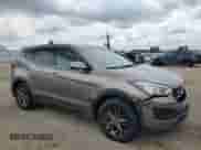 2015 Hyundai Santa Fe with VIN 5XYZT3LB0FG234784, listed as a Copart auction lot 64021415 with 148,439 mi miles and Salvage title. Bid and sale history available at DreamBid. Image 4.
