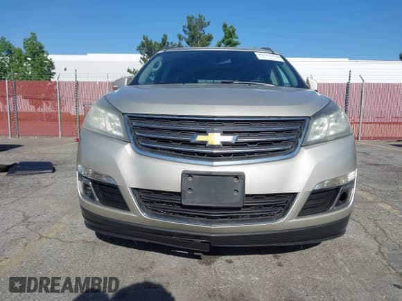 2014 Chevrolet Traverse LT z VIN 1GNKRHKD3EJ109929, wystawiony jako IAAI lot #42515411 z przebiegiem Nie podano mil oraz . Historia ofert i sprzedaży dostępna na DreamBid. Obrazek 6.