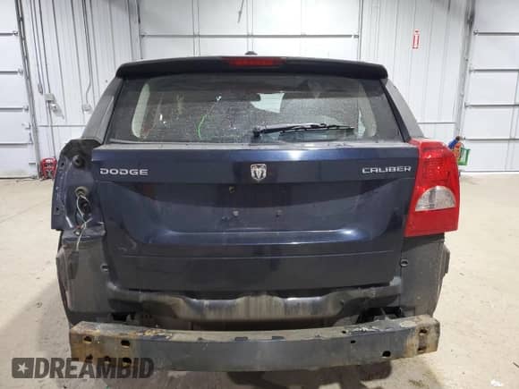 2011 Dodge Caliber z VIN 1B3CB1HA1BD111194, wystawiony jako Copart lot #82080054 z przebiegiem 133 455 mil mil oraz Szkoda całkowita • Salvage title. Historia ofert i sprzedaży dostępna na DreamBid. Obrazek 6.