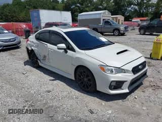 2021 Subaru WRX Premium with VIN JF1VA1C62M9811928, listed as a IAAI auction lot 42984567 with 31,668 mi miles and . Bid and sale history available at DreamBid. Image 1.