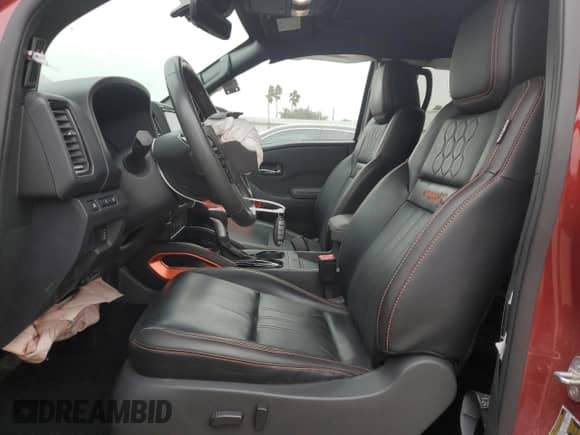 2023 Nissan Frontier Pro-X with VIN 1N6ED1EJ5PN635937, listed as a Copart auction lot 46035185 with 23,196 mi miles and Salvage title. Bid and sale history available at DreamBid. Image 7.