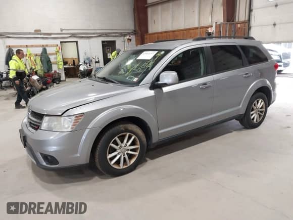 2017 Dodge Journey SXT with VIN 3C4PDDBG7HT515001, listed as a IAAI auction lot 43532217 with 124,332 mi miles and . Bid and sale history available at DreamBid. Image 2.