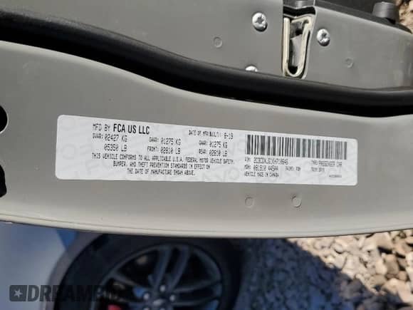 2019 Dodge Charger SXT with VIN 2C3CDXJG1KH710646, listed as a Copart auction lot 84826025 with 74,026 mi miles and Salvage title. Bid and sale history available at DreamBid. Image 13.