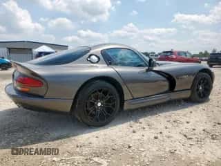 2002 Dodge Viper GTS с VIN 1B3ER69E22V102274, выставлен на аукционе Copart как лот 59537245 с пробегом 36 539 миль миль и Списание • Salvage title. История ставок и продаж доступна на DreamBid. Изображение 3.