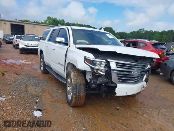 2017 Chevrolet Suburban Premier z VIN 1GNSCJKCXHR204770, wystawiony jako IAAI lot #42262898 z przebiegiem 166 304 mil mil oraz . Historia ofert i sprzedaży dostępna na DreamBid. Obrazek 1.