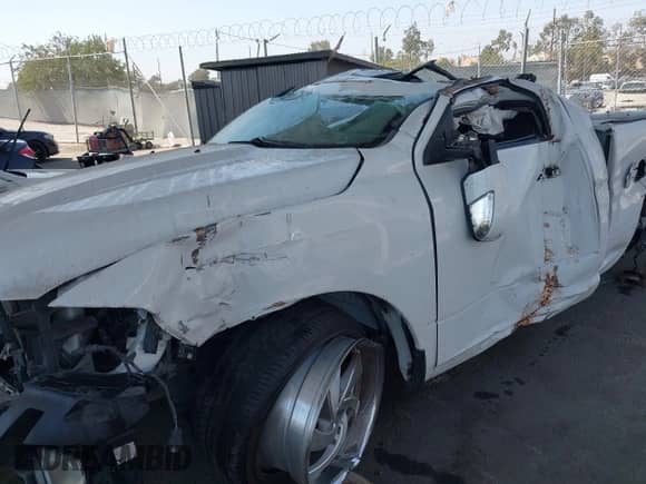 2014 Ram 1500 Express z VIN 3C6JR6AT4EG285012, wystawiony jako IAAI lot #42867183 z przebiegiem Nie podano mil oraz . Historia ofert i sprzedaży dostępna na DreamBid. Obrazek 6.