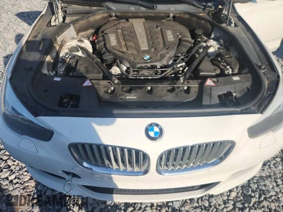 2013 BMW 5 Series с VIN WBASP0C54DC988039, выставлен на аукционе Copart как лот 65452075 с пробегом 102 817 миль миль и Чистый • Clean title. История ставок и продаж доступна на DreamBid. Изображение 11.