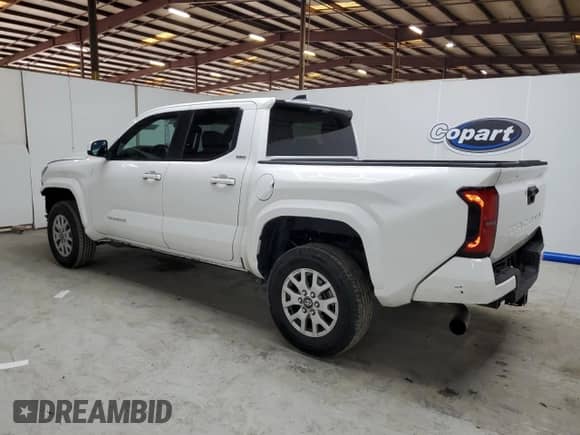 2024 Toyota Tacoma SR5 with VIN 3TMKB5FN2RM011207, listed as a Copart auction lot 80397465 with 28,515 mi miles and Clean title. Bid and sale history available at DreamBid. Image 2.