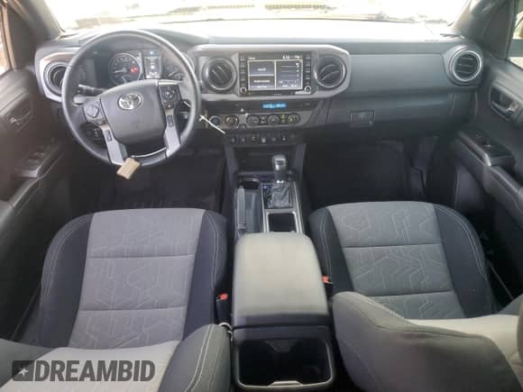 2022 Toyota Tacoma SR с VIN 3TYCZ5AN7NT062174, выставлен на аукционе Copart как лот 87050965 с пробегом 39 385 миль миль и Списание • Salvage title. История ставок и продаж доступна на DreamBid. Изображение 8.