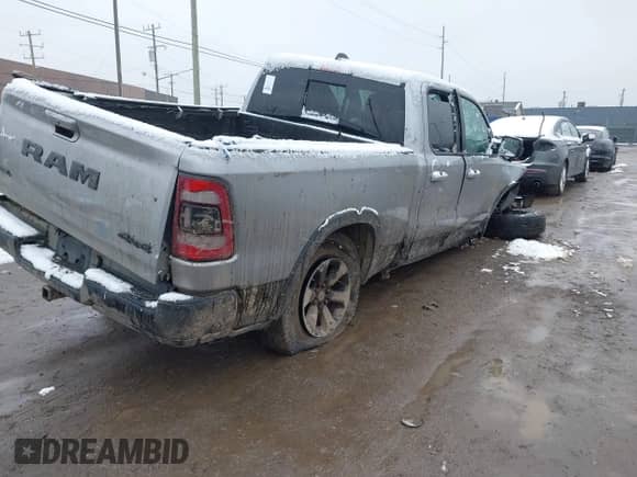 2019 Ram 1500 Rebel with VIN 1C6RRFEG1KN822602, listed as a IAAI auction lot 41156572 with 74,016 mi miles and . Bid and sale history available at DreamBid. Image 4.