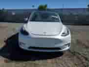 2022 Tesla Model Y Performance with VIN 7SAYGDEF1NF392212, listed as a Copart auction lot 85906245 with 34,897 mi miles and Salvage title. Bid and sale history available at DreamBid. Image 5.