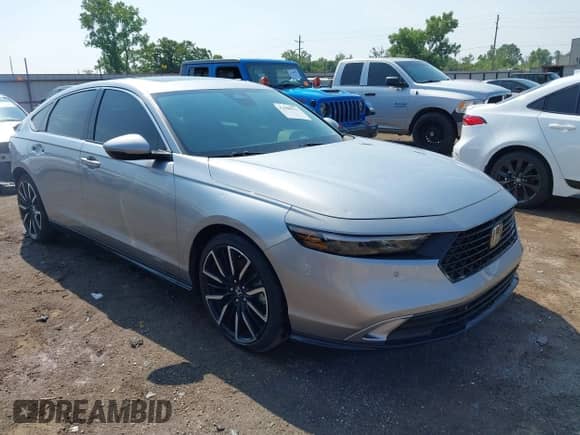 2023 Honda Accord Touring with VIN 1HGCY2F84PA002774, listed as a IAAI auction lot 42908552 with 35,396 mi miles and . Bid and sale history available at DreamBid. Image 1.