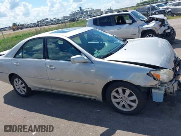 2003 Toyota Camry LE с VIN 4T1BF30K33U550358, выставлен на аукционе IAAI как лот 43047380 с пробегом 139 720 миль миль и . История ставок и продаж доступна на DreamBid. Изображение 14.
