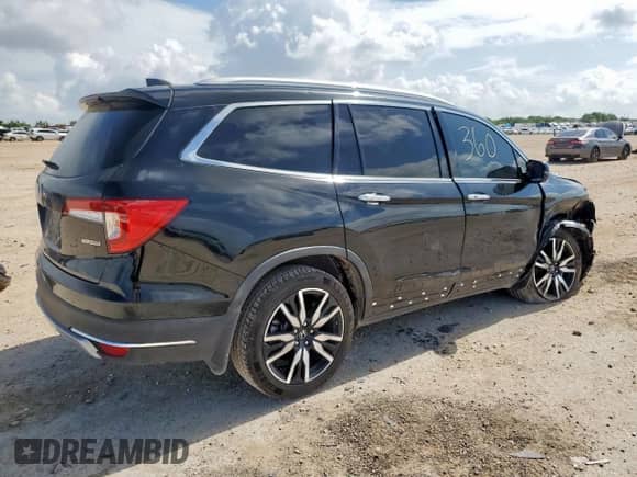 2020 Honda Pilot Touring 8-Passenger с VIN 5FNYF5H95LB005816, выставлен на аукционе Copart как лот 63781565 с пробегом 80 979 миль миль и Списание • Salvage title. История ставок и продаж доступна на DreamBid. Изображение 3.