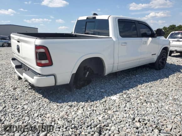 2021 Ram 1500 Limited с VIN 1C6RREHT2MN828480, выставлен на аукционе Copart как лот 80401335 с пробегом 54 492 миль миль и Списание • Salvage title. История ставок и продаж доступна на DreamBid. Изображение 3.